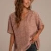 Rust Animal Print V Neck Front Pocket Top