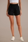 Black Smocked Waist Ruffle Hem Pocketed Shorts
